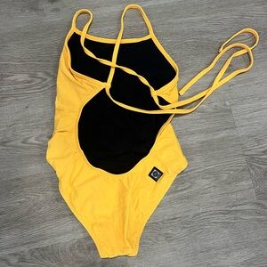 Jolyn mango color tie back one piece